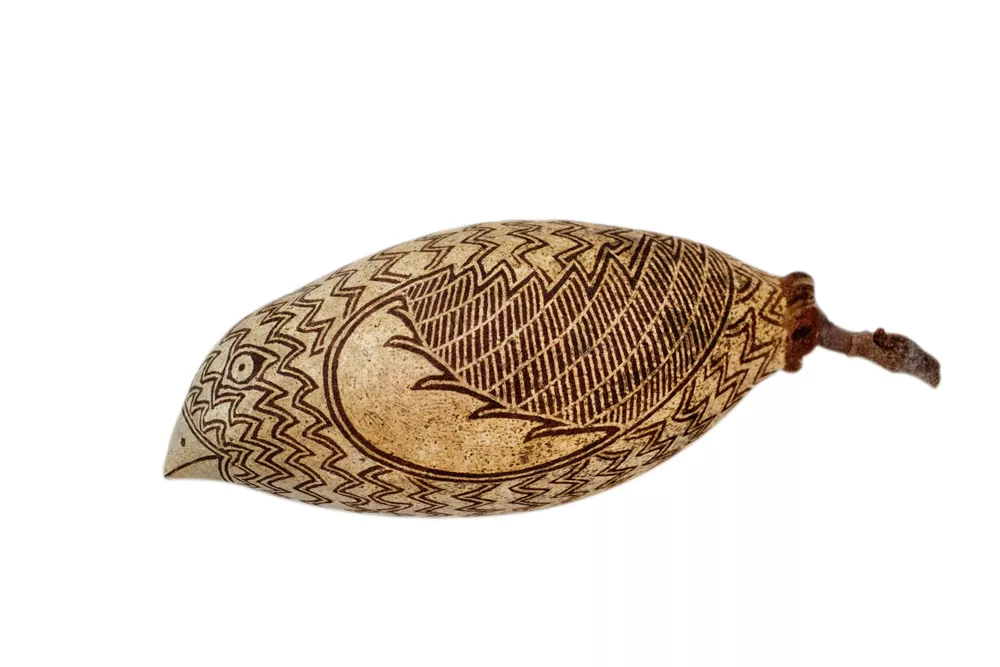 Nathan Thomas, Gija people, Western Australia, born Halls Creek, Western Australia 1978, Untitled (Boab Bird), 2021, Kununurra, Western Australia, engraved boab nut, 19.0 x 9.0 x 9.0 cm © Nathan Thomas/Waringarri Arts
