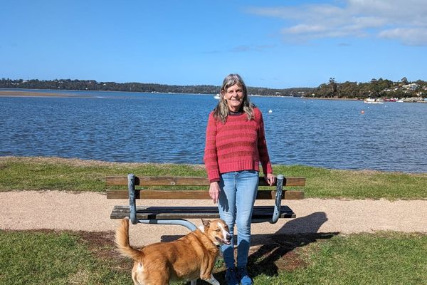 Nicotine Management client, Suzie with her dog at St Helens