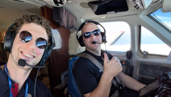 Sean in cockpit with RFDS Pilot