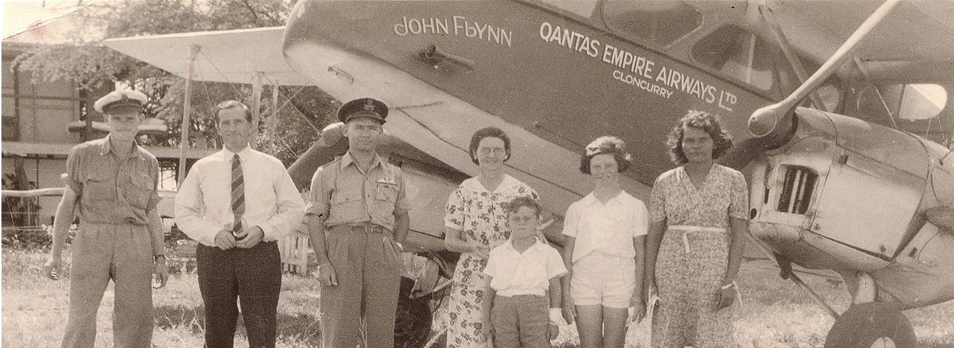 Group of people standing in front of the John Flynn Qantas Aircraft based in Cloncurry