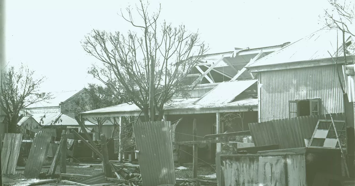 Buildings showing force of cyclone - AGSA Collection