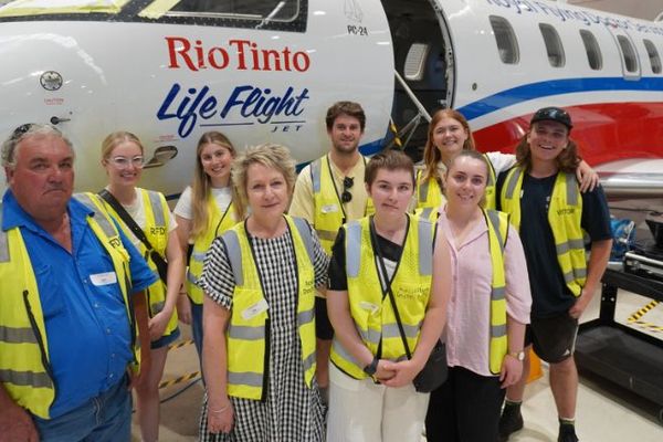 Laura and her family in the RFDS WA hangar