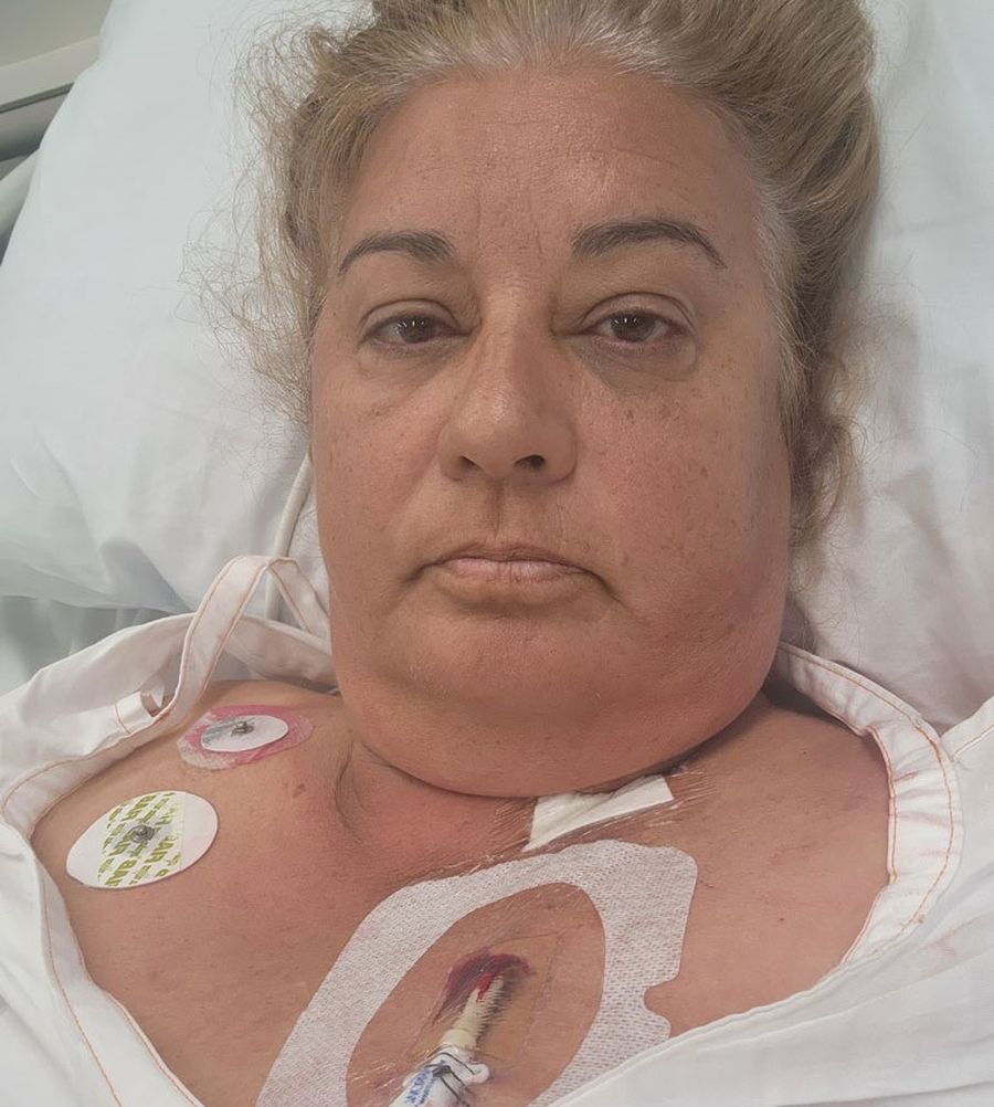 Carol in a hospital bed