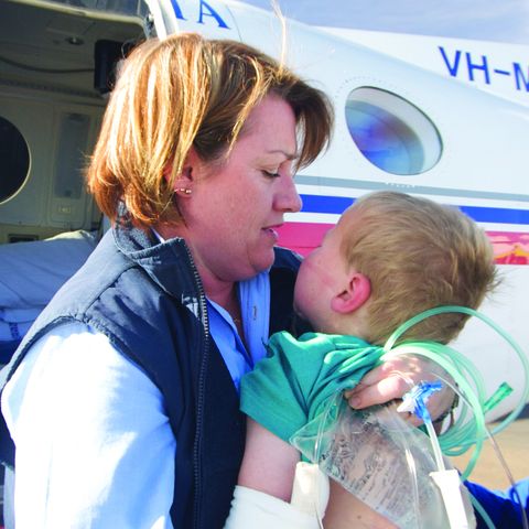 RFDS nurse with a baby