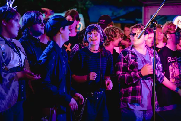 Young people dancing in crowd