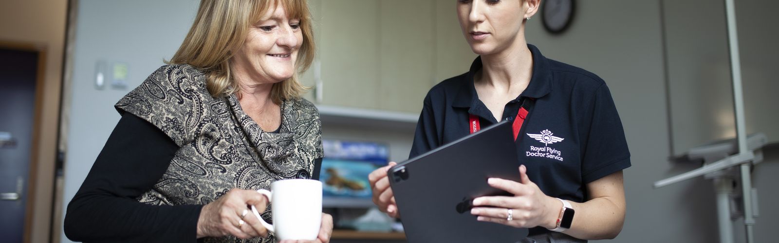 Two women talking in an office