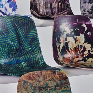 A close up of stadium seats made using colourful headscarves