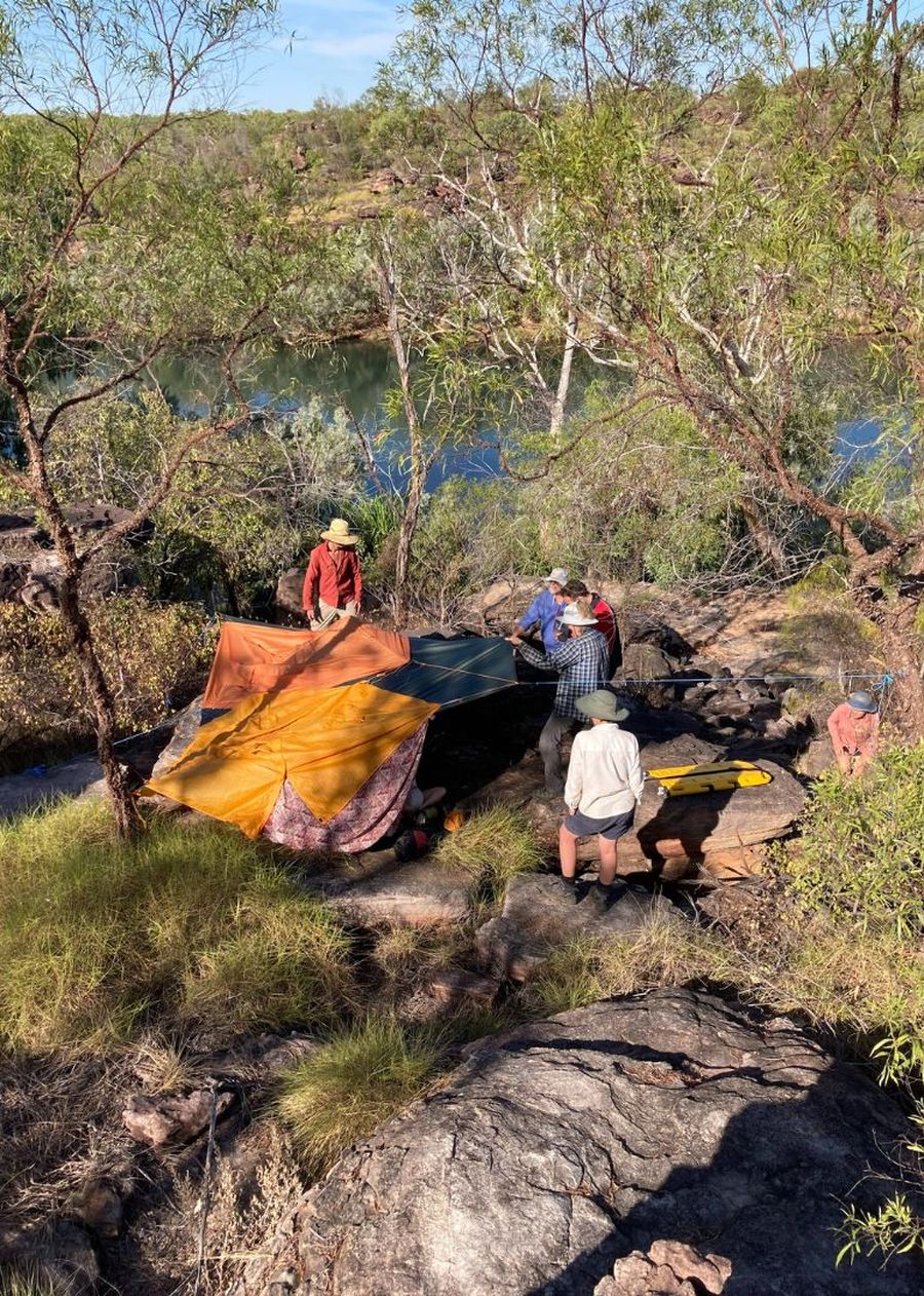 Hikers set up tents for visibility