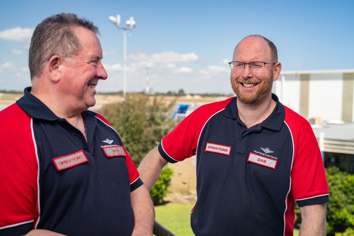 Dan Byles smiling with colleague, Pete