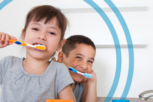 Kids brush their teeth in the bathroom