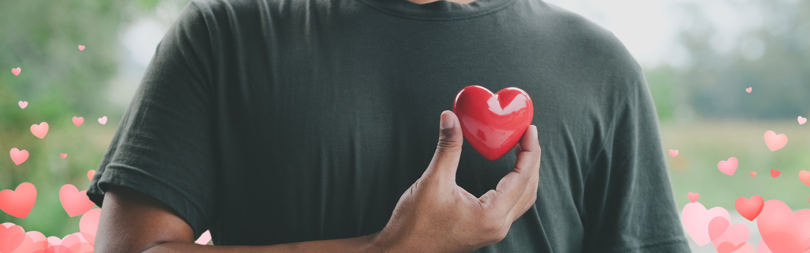 A man holds a heart to his chest