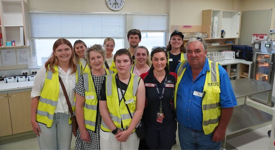 Laura and family in the RFDS clinic.