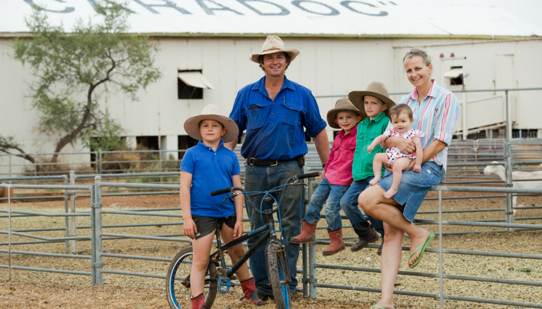 Harvey Family in front of their shearing shed