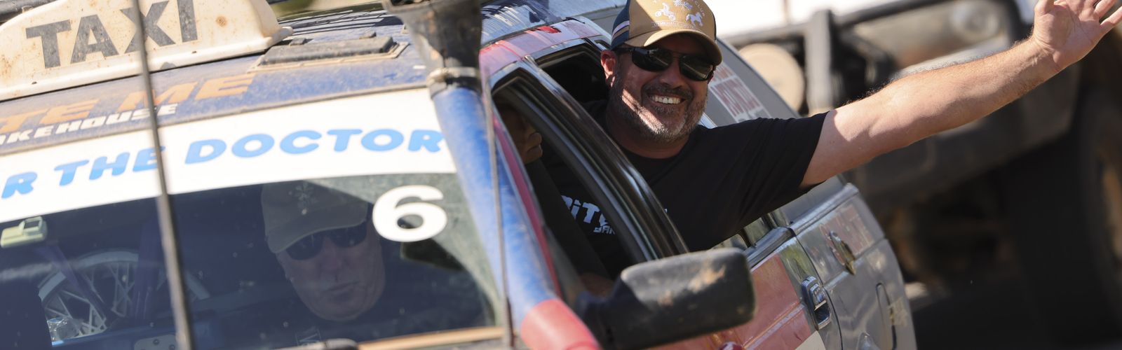 Trekker smiling in car 