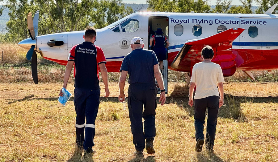 Doctor and patients on a farm