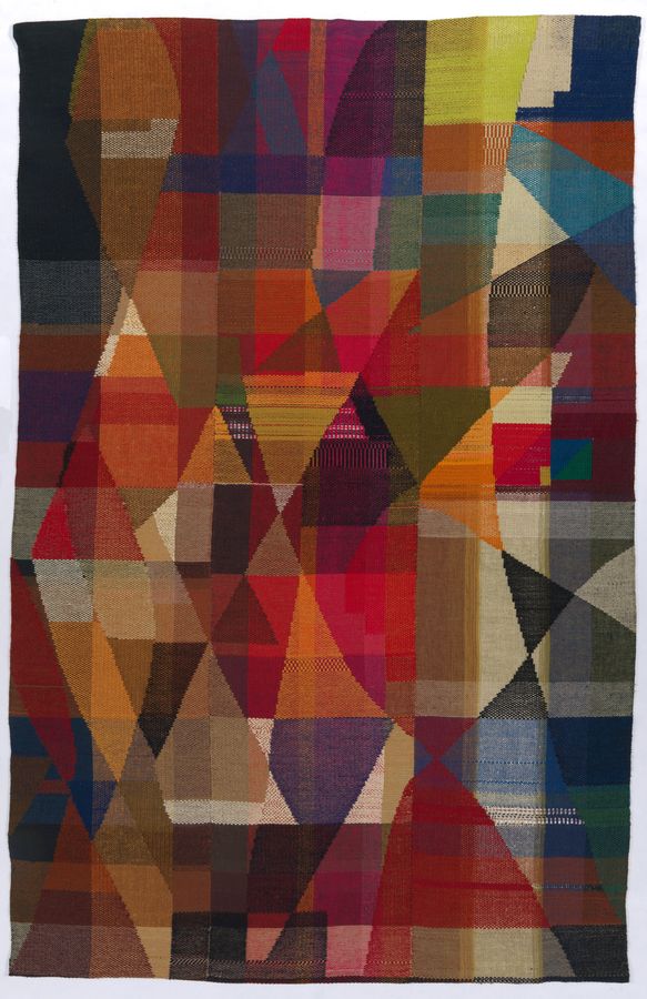 brightly coloured textile wall hanging with geometric shapes