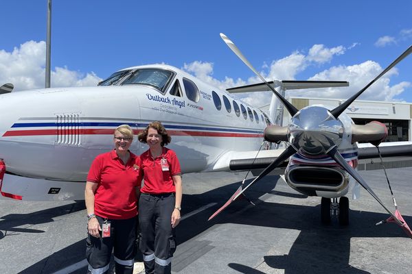 Susan Markwell and Maree Cummins with an RFDS aircraft