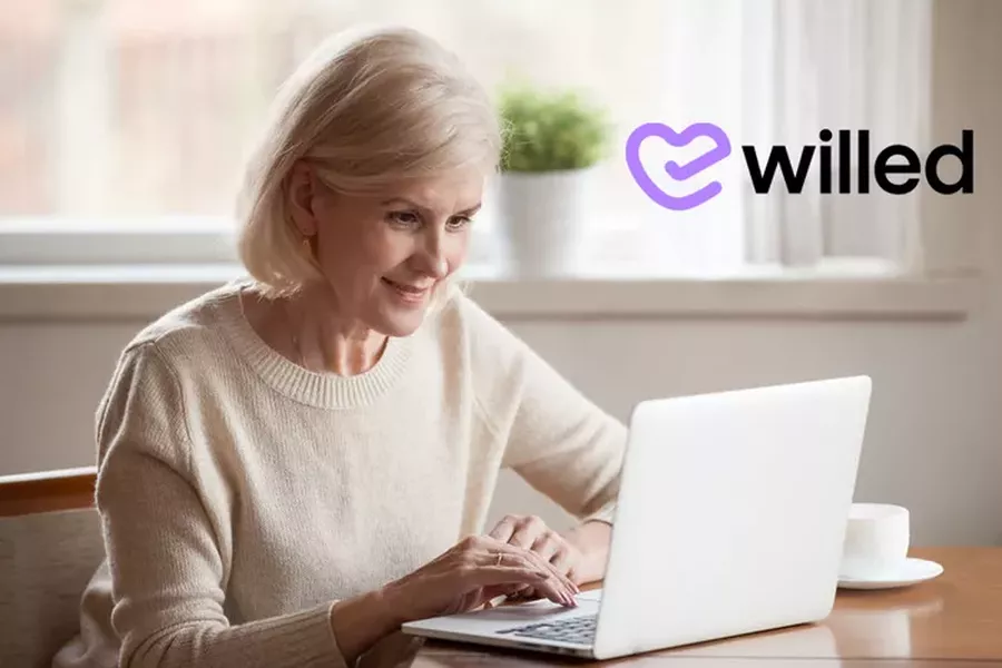 Image of an older woman working on her computer