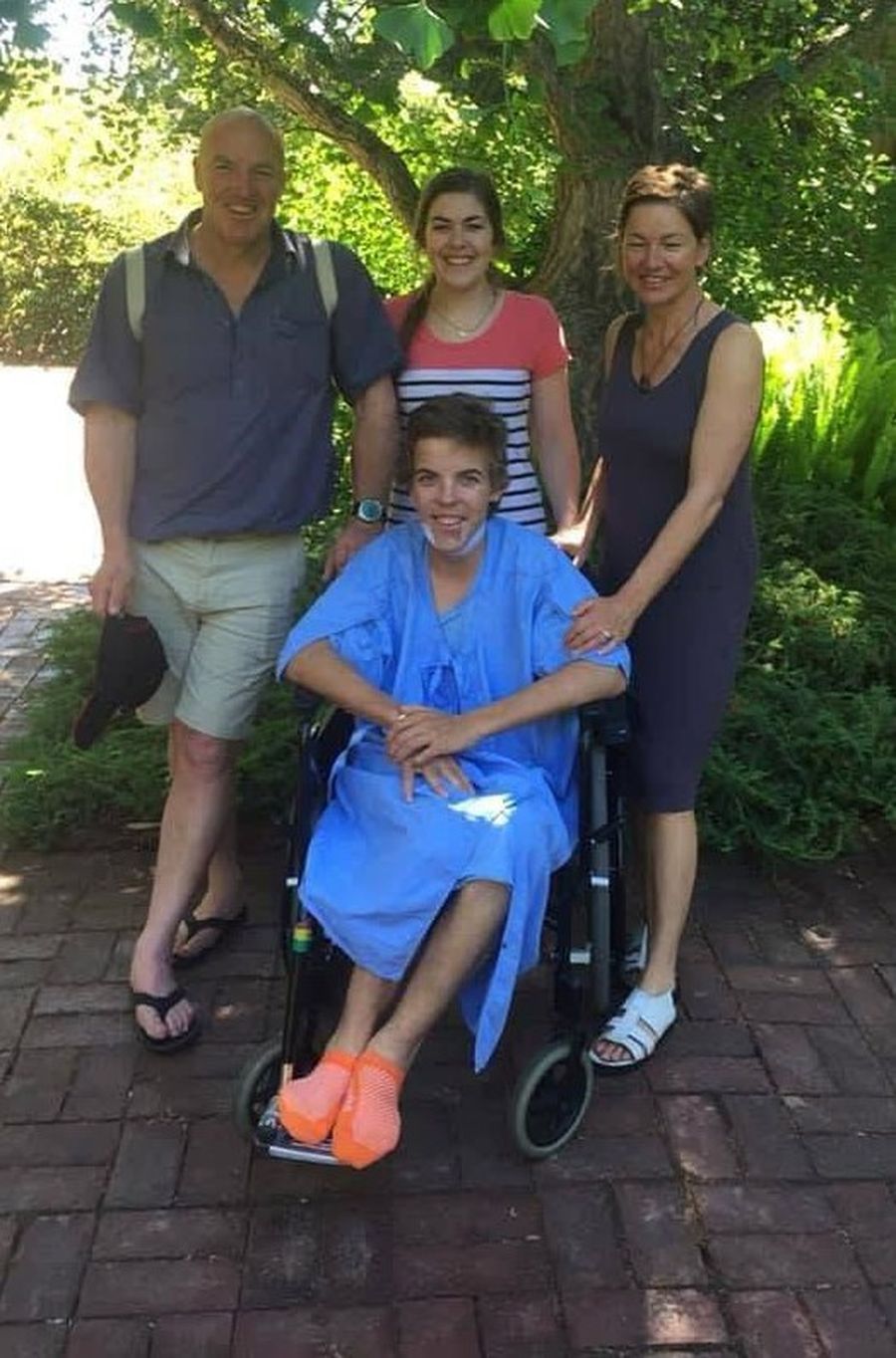 Fergus pictured with his family after his accident