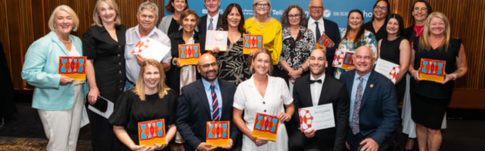 The RFDS team accepting awards in Canberra