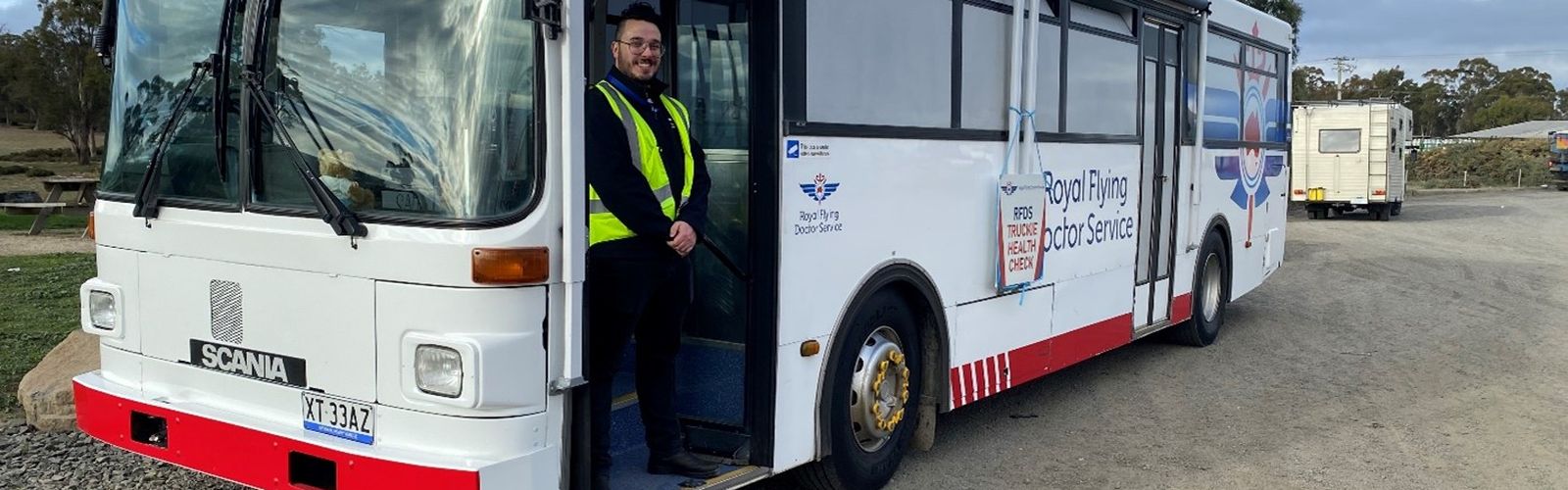 Physical health worker, Lachlan in the RFDS Tasmania health hub bus.