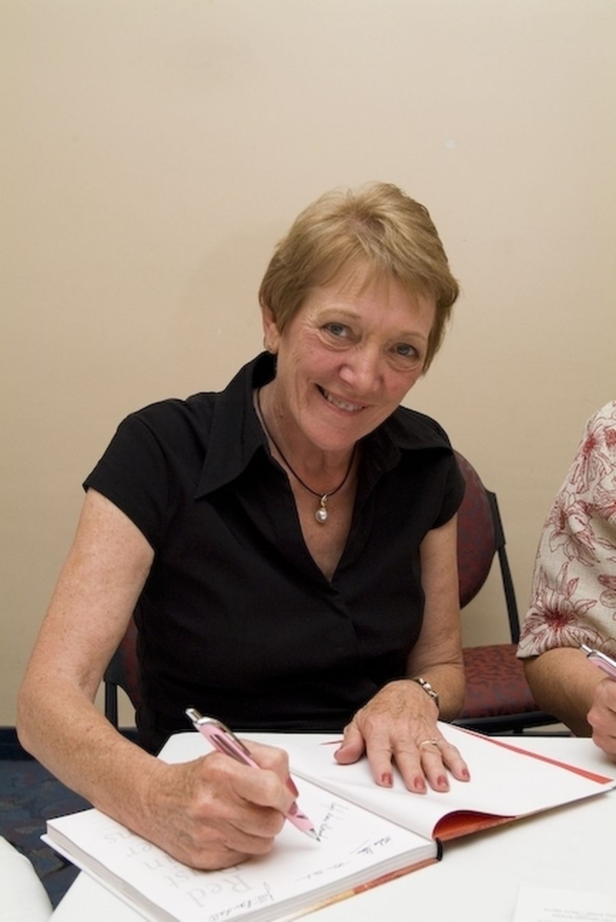 MElva stone signs red dust in her veins 