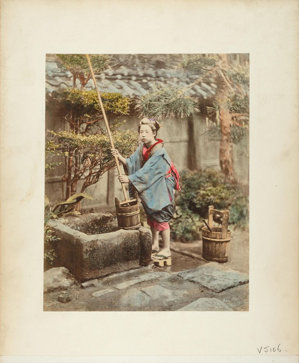 Woman drawing water from well - AGSA Collection