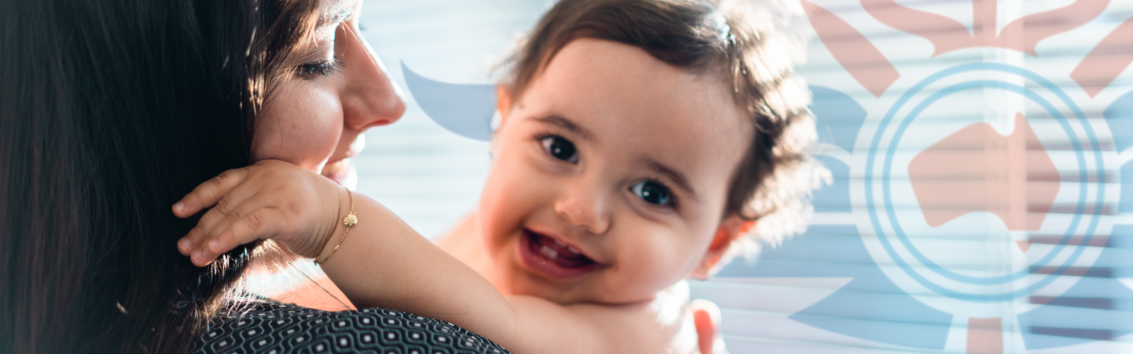  A woman holds her smiling baby