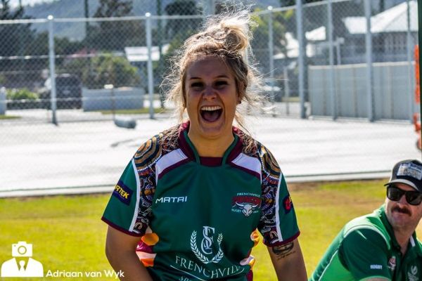 Jess smiling at camera