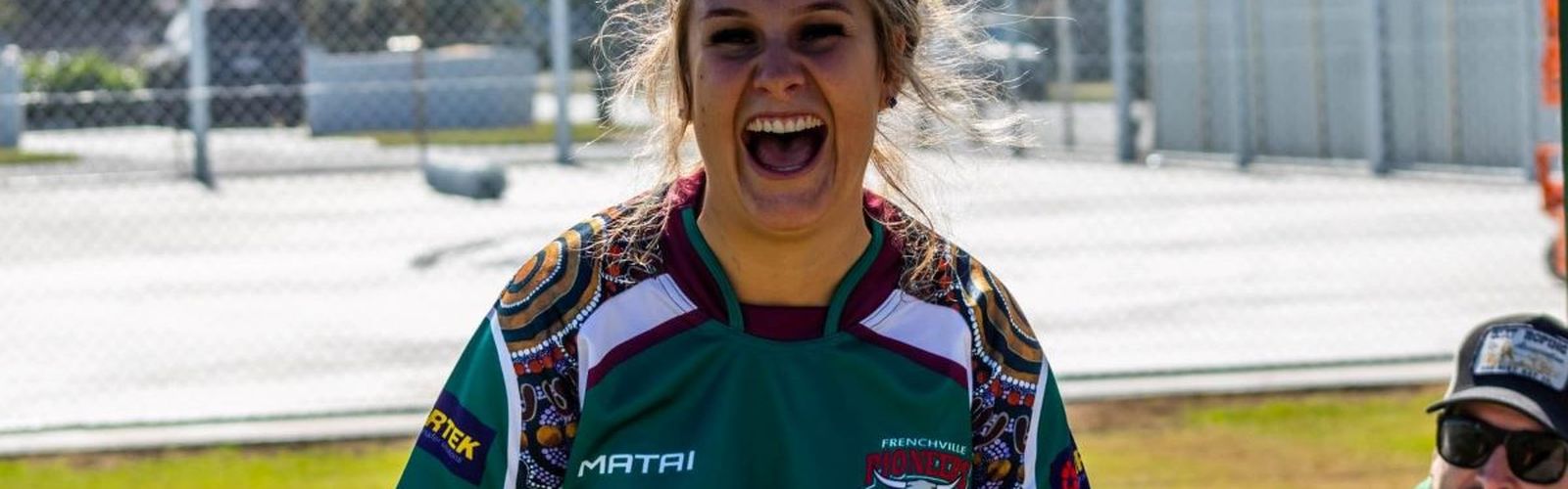 Jess smiling at camera