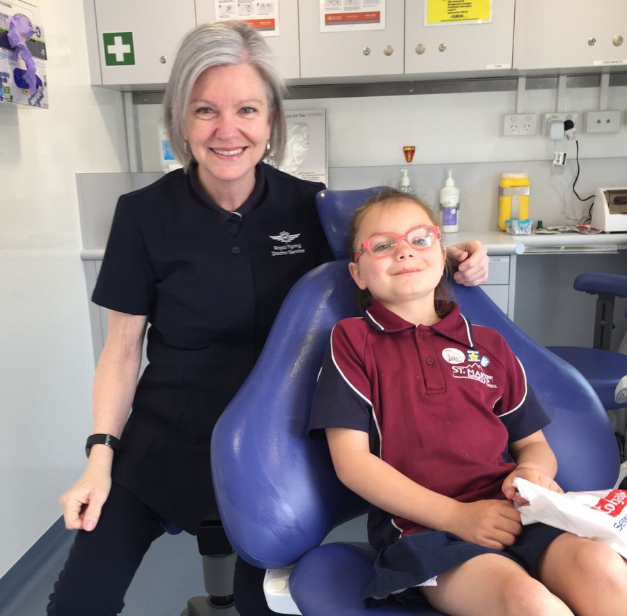 RFDS Tasmanai Dental Assistant, Megan with Evie.