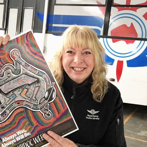 RFDS Staff Holds NAIDOC Poster