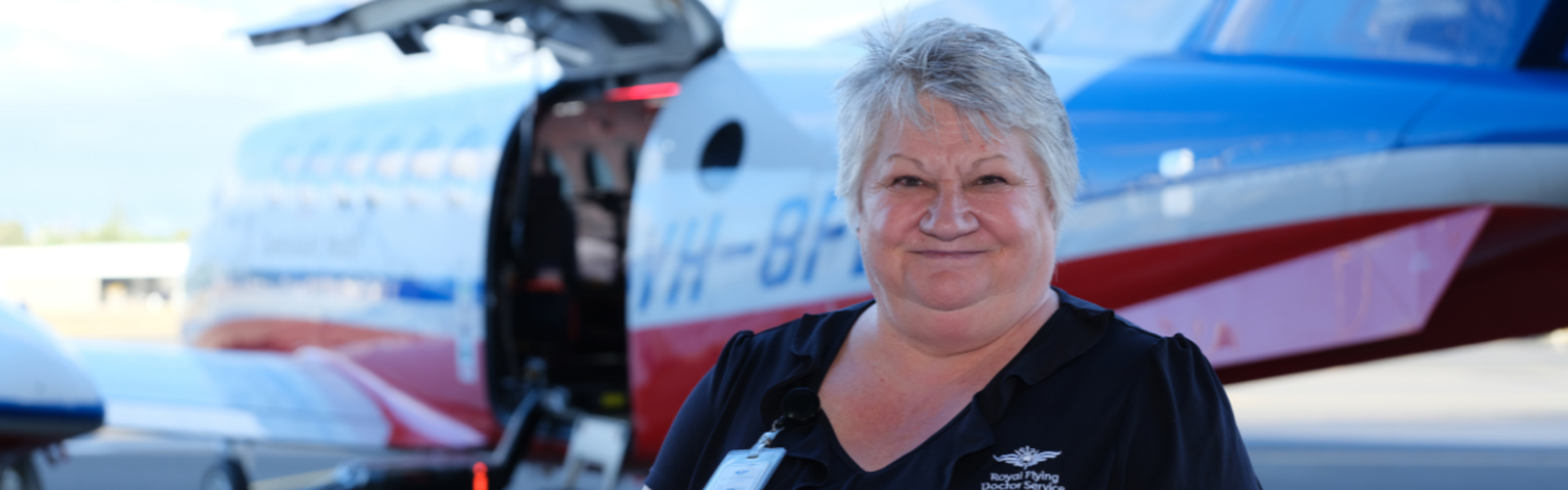Trish in front of aircraft