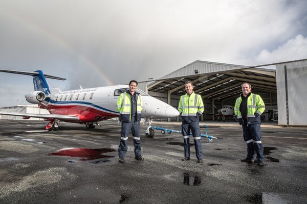 RFDS crew standing in front of aircraft