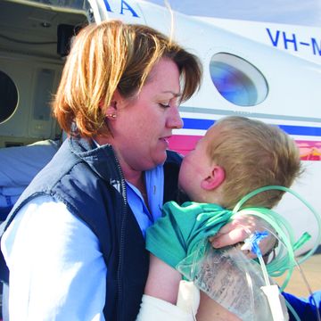 RFDS nurse with a baby
