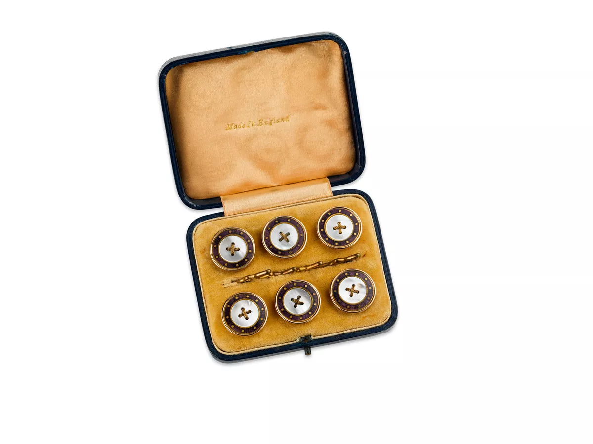 Six pearl shell buttons - AGSA Collection