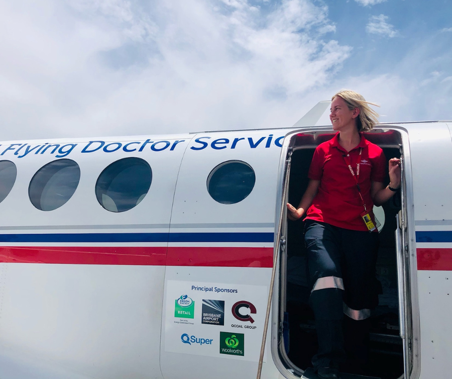 Jamie-Lee stepping out of aircraft 