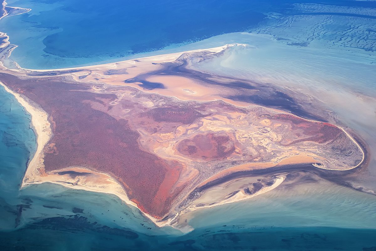 Birdseye view photo taken above the coastline of Broome's Roebuck Bay.