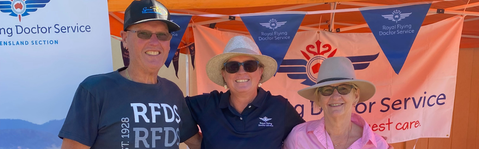 Victoria in between community members