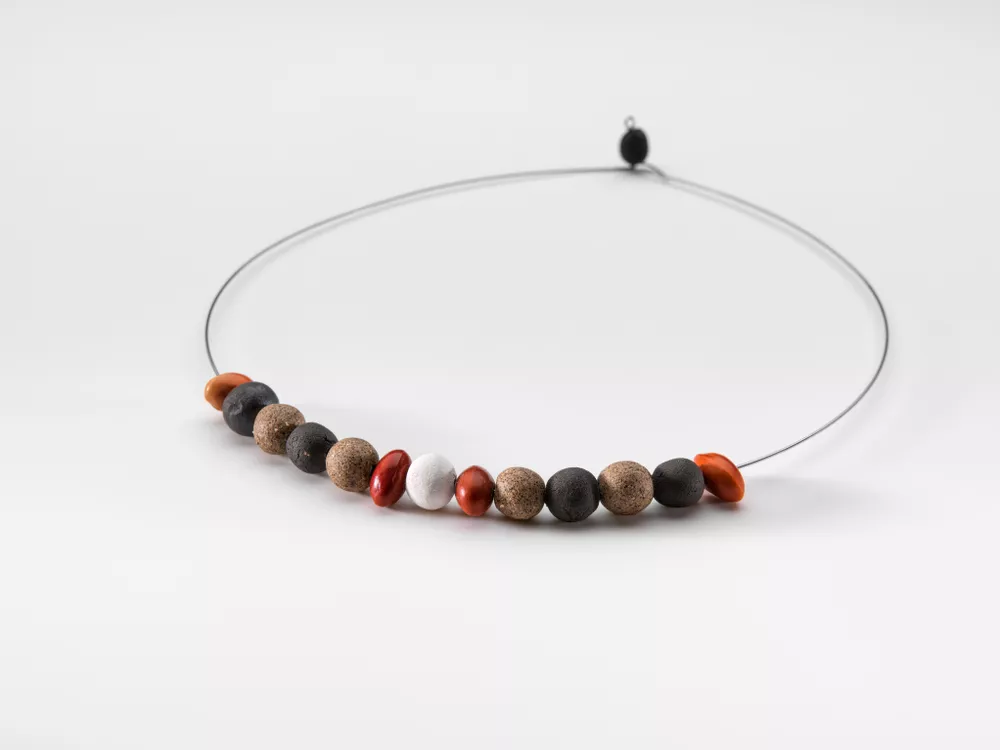 Jayanna Andy, Pitjantjatjara people, born 1999, Pukatja (Ernabella), South Australia, Roxanne Carroll, Pitjantjatjara people, born 1997, Pukatja (Ernabella), South Australia, Marceena Jack, Pitjantjatjara people, born 1996, Mparntwe (Alice Springs), Northern Territory, Vennita Lionel, Pitjantjatjara people, born 1998, Pukatja (Ernabella), South Australia, Nicole Rupert, Pitjantjatjara people, born 1987, Mparntwe (Alice Springs), Northern Territory, Marissa Thompson, Pitjantjatjara people, born 1985, Pukatja (Ernabella), South Australia, Liritja II, 2019, Pukatja (Ernabella), South Australia, ceramics, ininti seeds and stainless steel,
16.0 cm (diameter); © Ernabella Arts Inc., photo: Grant Hancock