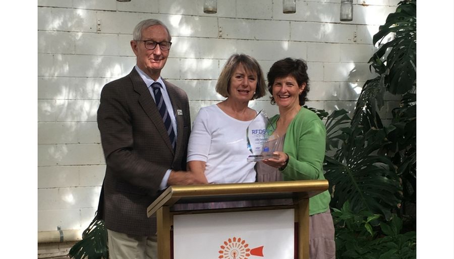 Liz Lynch accepting the award on behalf of Leslie