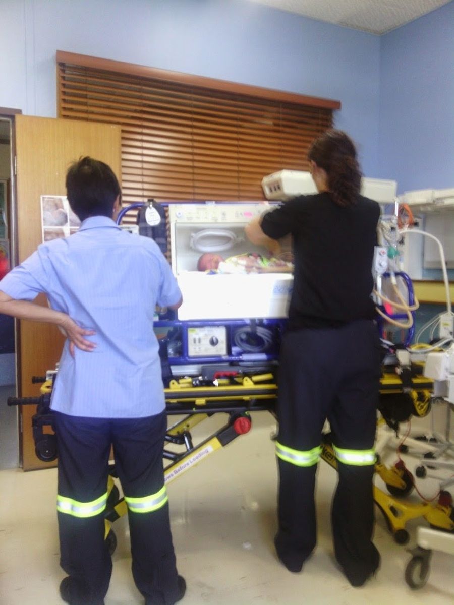 BAM! The ambulance hit a roo. Kate, in labour, held her breath...