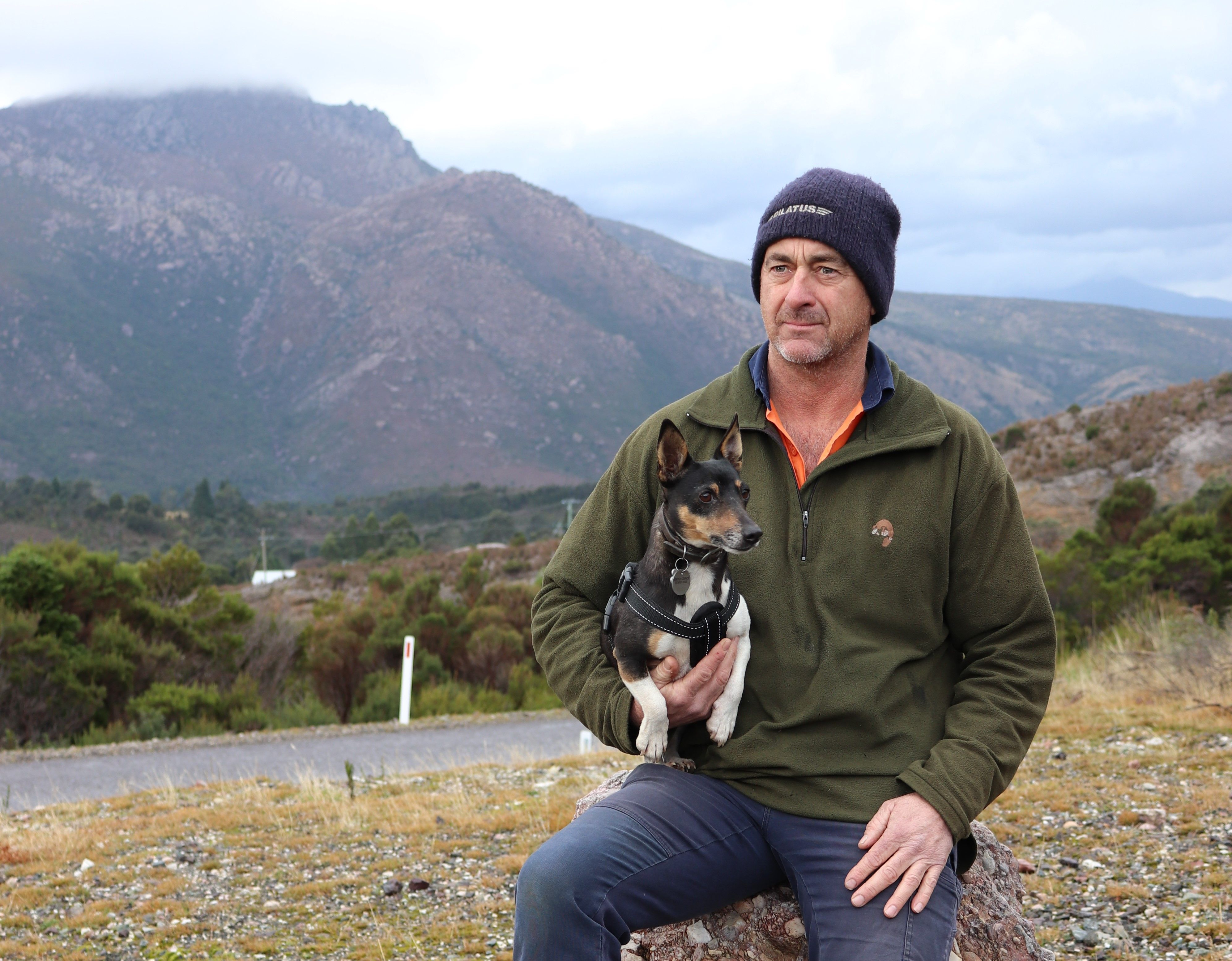 Phil and dog (Digger) wait for RFDS Tasmania's mental health hub Bus