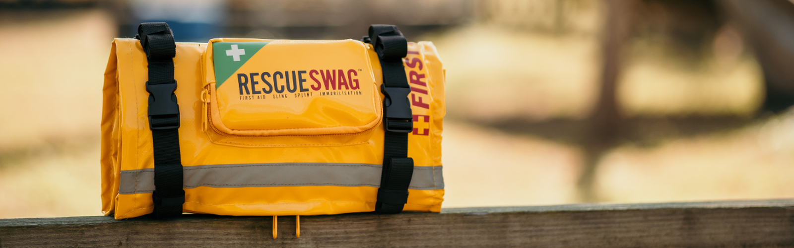 bright yellow Rescue Swag on fence