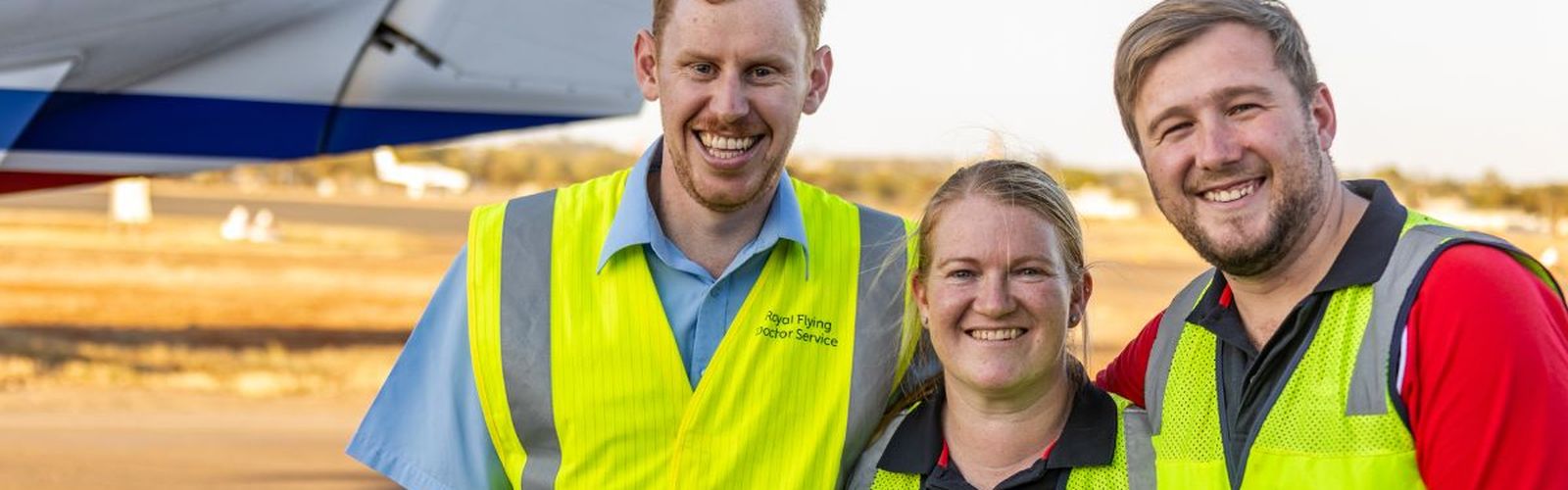 Judith Barker and Sam Walsh standing with the Life Member recipients