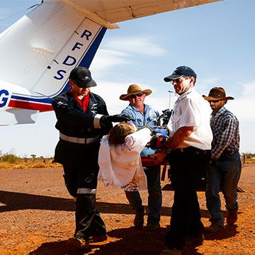 Loading a patient onto RFDS plane