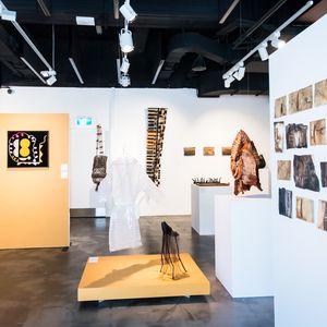 A wide shot of the exhibition showing numerous works