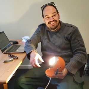 Duncan holding his orange Lamp