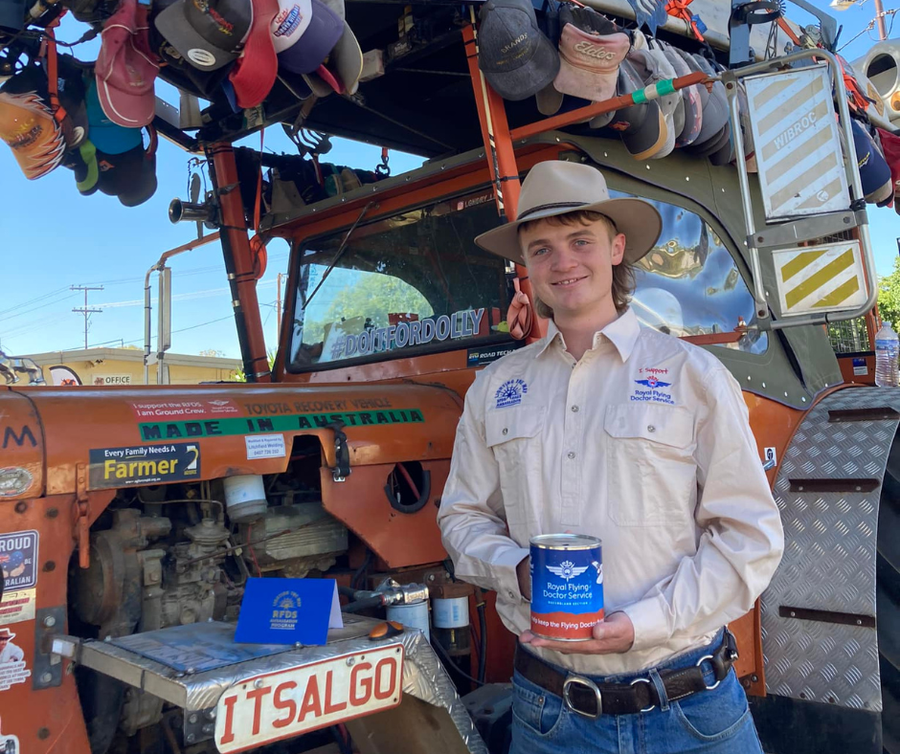 Sam beside his tractor
