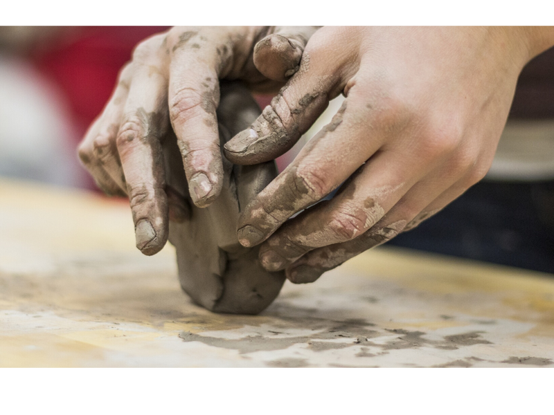 Canva image clay working hands